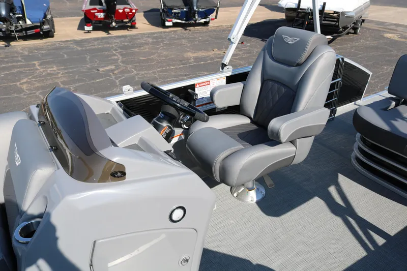 Slide: The Image of 2026 Bennington 22SX Stern Radius boat seating, featuring sleek gray upholstery and modern design. - 30