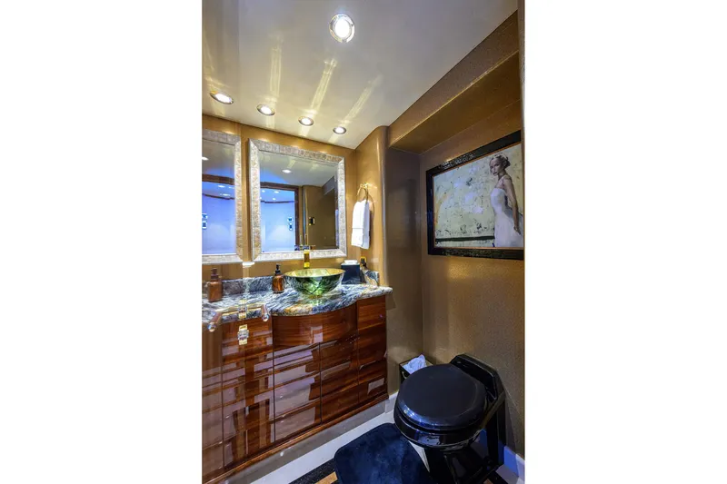 Slide: The Image of Luxurious interior of 2014 Westport 112 yacht with elegant wood finishes and modern seating. - 15