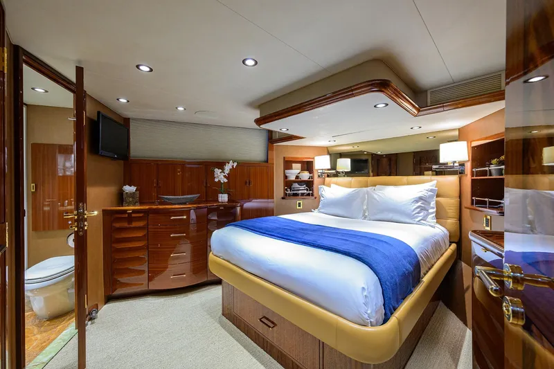 Slide: The Image of Luxurious bathroom in 2014 Westport 112 yacht with glass shower and elegant vanity. - 23