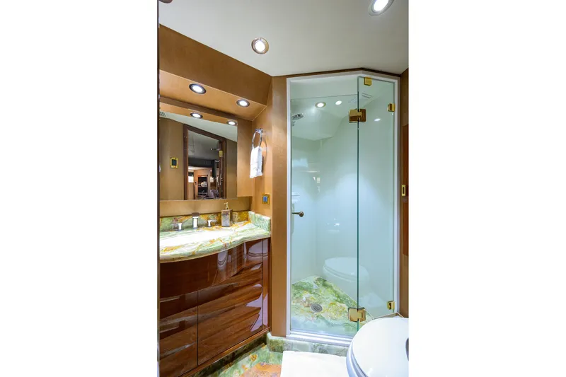 Slide: The Image of Luxurious interior of 2014 Westport 112 yacht with elegant staircase and modern decor. - 24