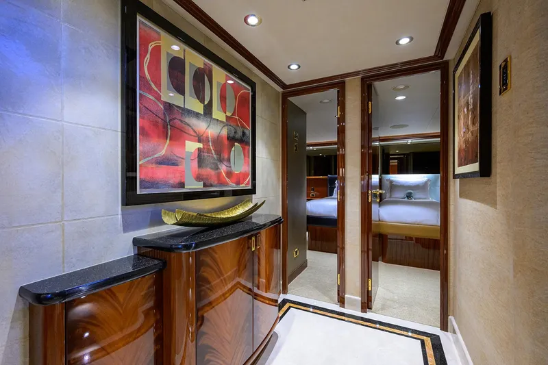 Slide: The Image of Luxurious interior of 2014 Westport 112 yacht featuring elegant woodwork and modern art. - 26