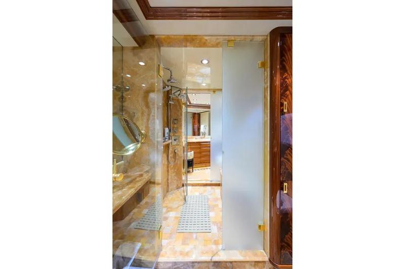 Slide: The Image of Luxurious bathroom in 2014 Westport 112 yacht with marble shower and elegant fixtures. - 36
