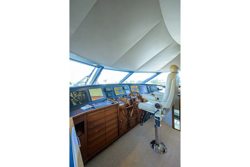 Slide: The Image of Luxurious helm of 2014 Westport 112 yacht with advanced navigation systems. - 48