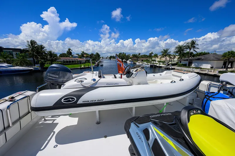 Slide: The Image of Spacious deck of 2014 Westport 112 yacht with cushioned seating. - 54