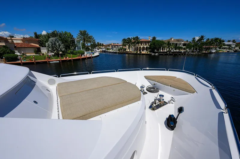 Slide: The Image of Luxurious 2014 Westport 112 yacht helm with modern navigation equipment and plush seating. - 61