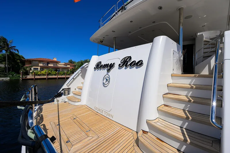 Slide: The Image of Luxury yacht "Remy Roo" docked, Westport 112 model, 2014, with elegant wooden steps. - 64