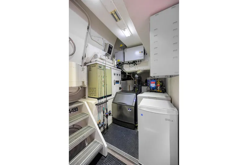 Slide: The Image of Engine room of 2014 Westport 112 yacht, featuring advanced machinery and equipment. - 70