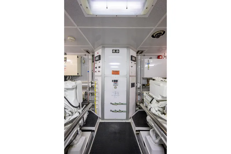 Slide: The Image of Engine room of 2014 Westport 112 yacht with equipment and storage. - 71