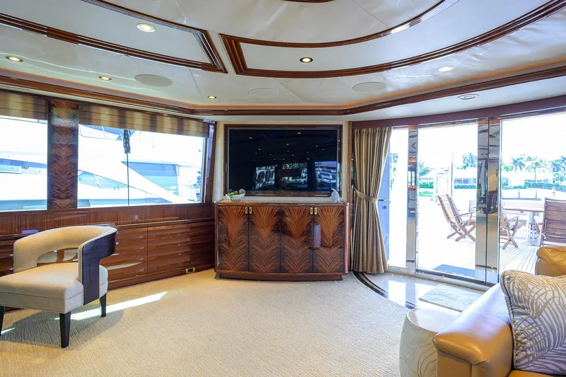 Slide: The Image of Luxurious interior of 2014 Westport 112 yacht with elegant furnishings and large windows. - 8