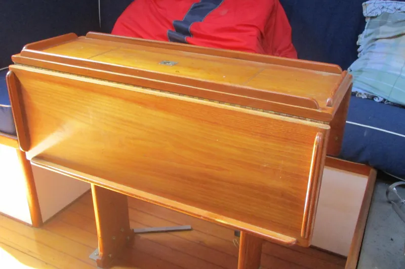 Slide: The Image of Wooden interior table on 1955 Custom Gaff Rigged Ketch sailboat. - 18