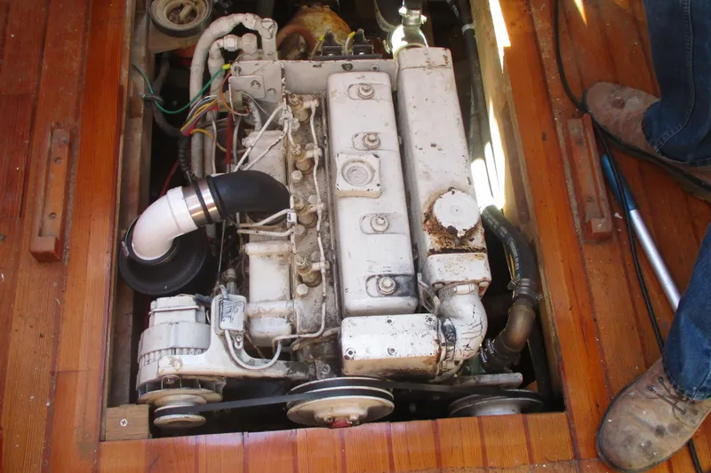 Slide: The Image of Engine of 1955 Custom Gaff Rigged Ketch, exposed in wooden compartment. - 26