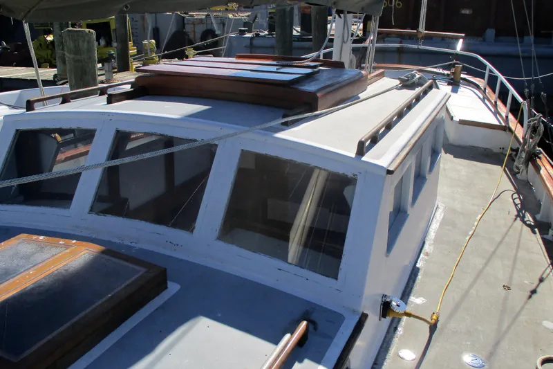 Slide: The Image of 1955 Custom Gaff Rigged Ketch, full keel, deck view with cabin and rigging details. - 38