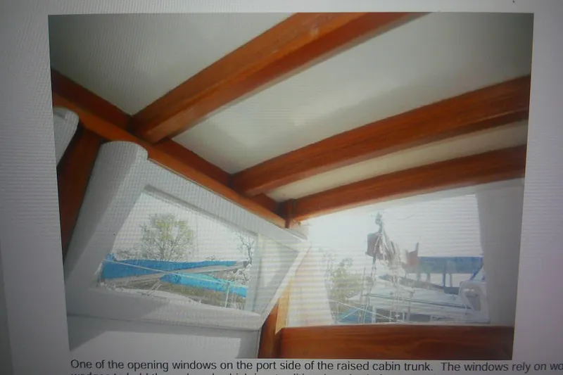 Slide: The Image of Interior view of 1955 Custom Gaff Rigged Ketch with open portside window. - 43