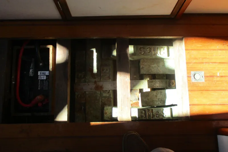 Slide: The Image of Interior view of 1955 Custom Gaff Rigged Ketch showing battery and ballast arrangement. - 45