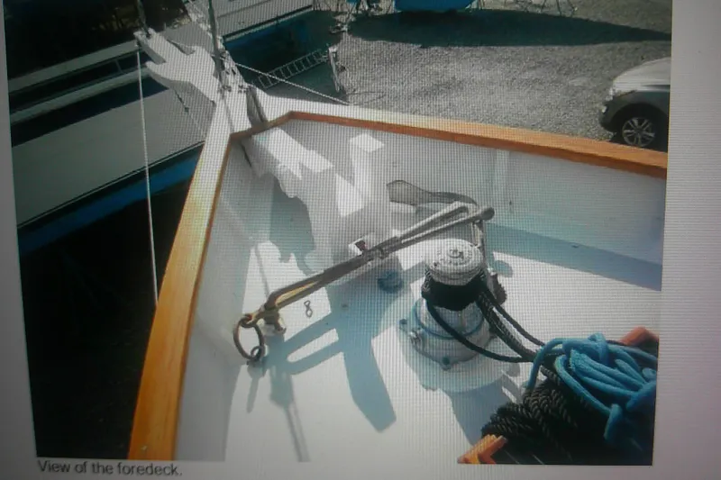 Slide: The Image of Foredeck of 1955 Custom Gaff Rigged Ketch with winch and ropes. - 46