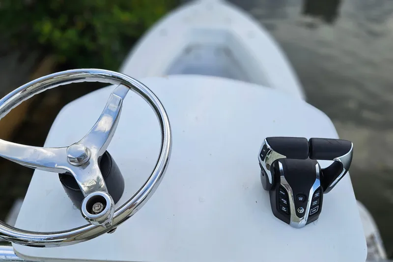 Slide: The Image of 2002 Contender 31 Open boat deck with railing and water view. - 22