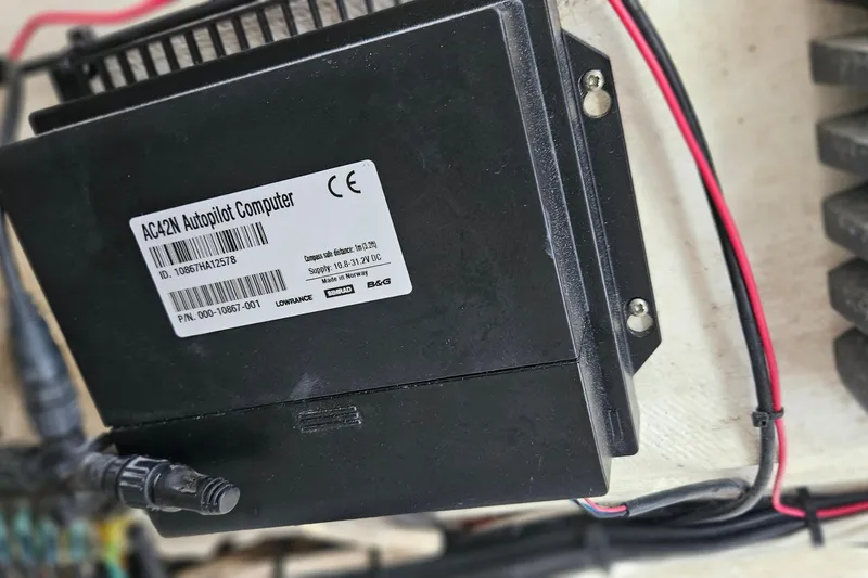 Slide: The Image of Fusion D-Class amplifier on a 2002 Contender 31 Open boat, showing water spots. - 31