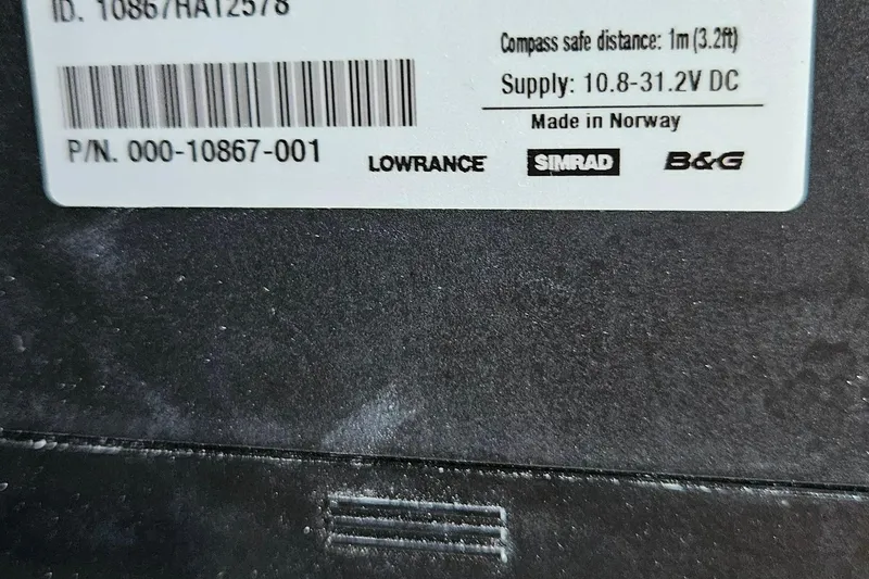 Slide: The Image of Close-up of Yamaha CL5-1 component on 2002 Contender 31 Open boat. - 38