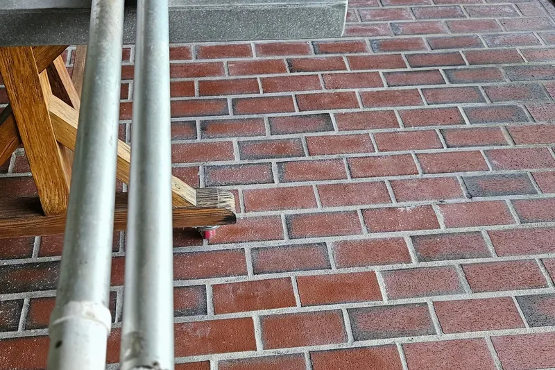 Slide: The Image of 2002 Contender 31 Open boat with covered engines docked by a lakeside deck. - 55