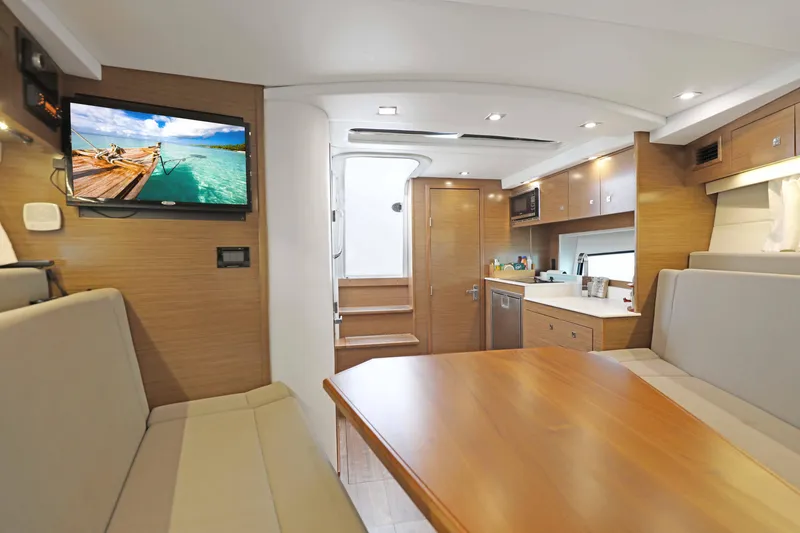 Slide: The Image of Luxurious interior of 2018 Cruisers Yachts 390 EC with modern amenities and elegant design. - 54