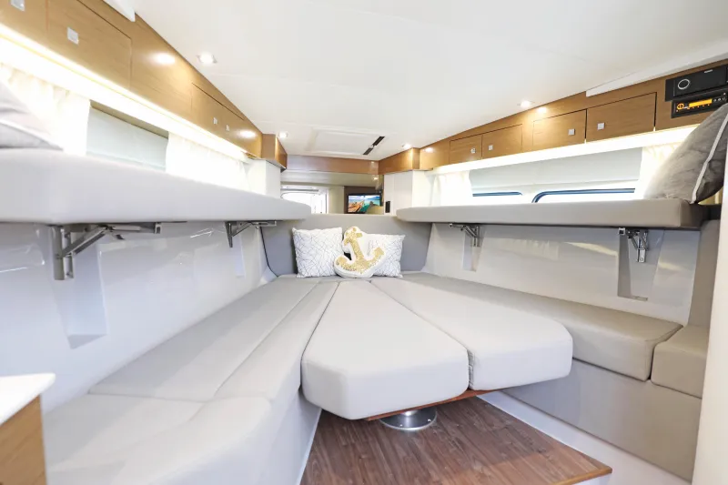 Slide: The Image of Interior of 2018 Cruisers Yachts 390 EC, featuring modern seating and elegant design. - 59