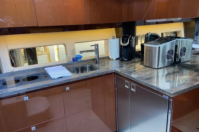 Slide: The Image of Luxurious kitchen interior of 2015 Sea Ray 470 Sundancer yacht with modern appliances. - 22