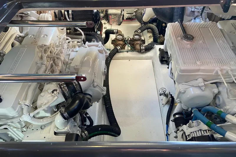 Slide: The Image of Engine room of 2015 Sea Ray 470 Sundancer yacht, showcasing clean, organized machinery. - 45
