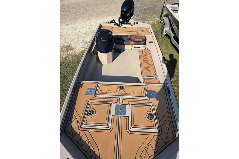 Slide: The Image of 2026 Avid 18 Rogue SC boat with tan deck and black motor. - 4