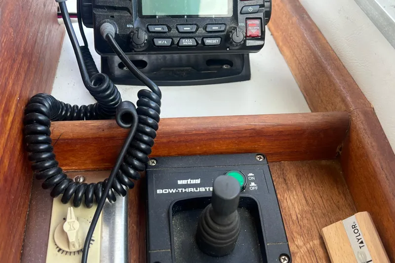 Slide: The Image of Control panel of a 1994 Zimmerman Marine Z36 Sedan Cruiser with radio and bow thruster. - 13