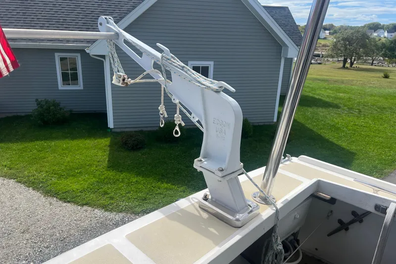 Slide: The Image of Deck view of 1994 Zimmerman Marine Z36 Sedan Cruiser with davit and American flag. - 14