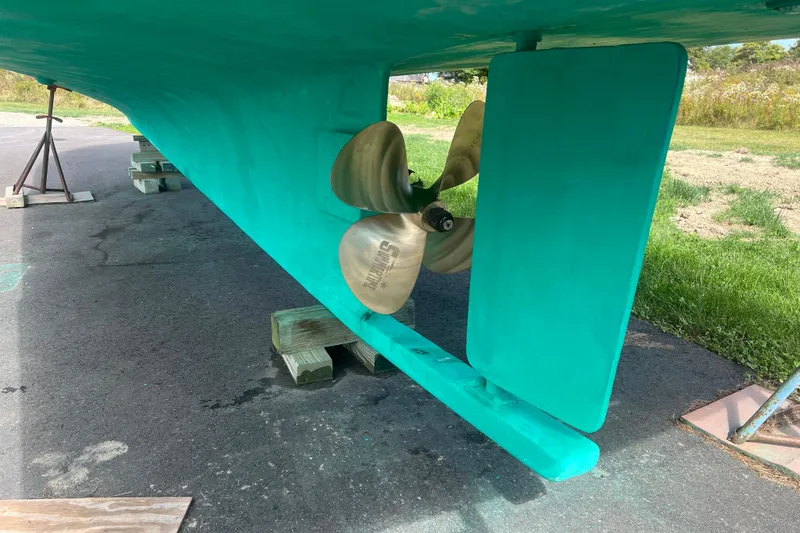 Slide: The Image of Propeller and rudder of 1994 Zimmerman Marine Z36 Sedan Cruiser on dry dock. - 15