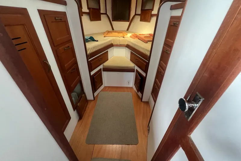 Slide: The Image of Interior of 1994 Zimmerman Marine Z36 Sedan Cruiser with wood paneling and cozy seating. - 4