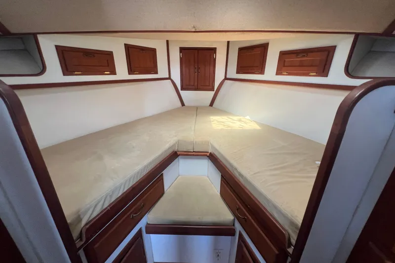 Slide: The Image of Interior cabin of 1994 Zimmerman Marine Z36 Sedan Cruiser with wooden storage cabinets. - 5