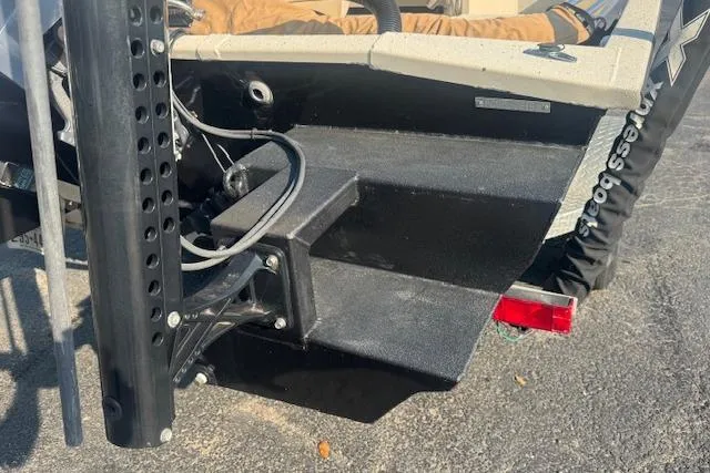 Slide: The Image of Rear view of 2019 Xpress H20 boat showing motor mount and hull details. - 7