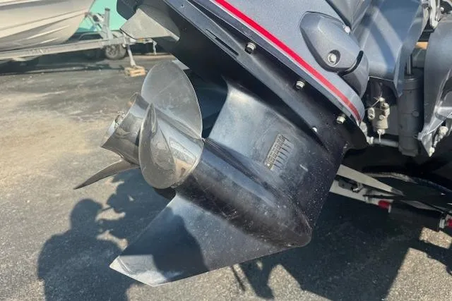 Slide: The Image of Close-up of a 2019 Xpress H20 boat propeller in a sunny outdoor setting. - 9