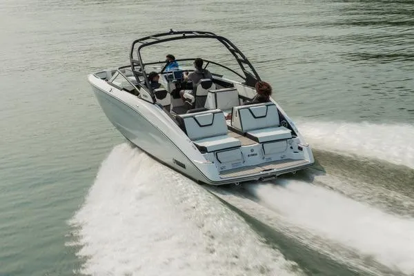 Slide: The Image of 2026 Yamaha Boats 252S cruising on water with passengers enjoying the ride. - 3