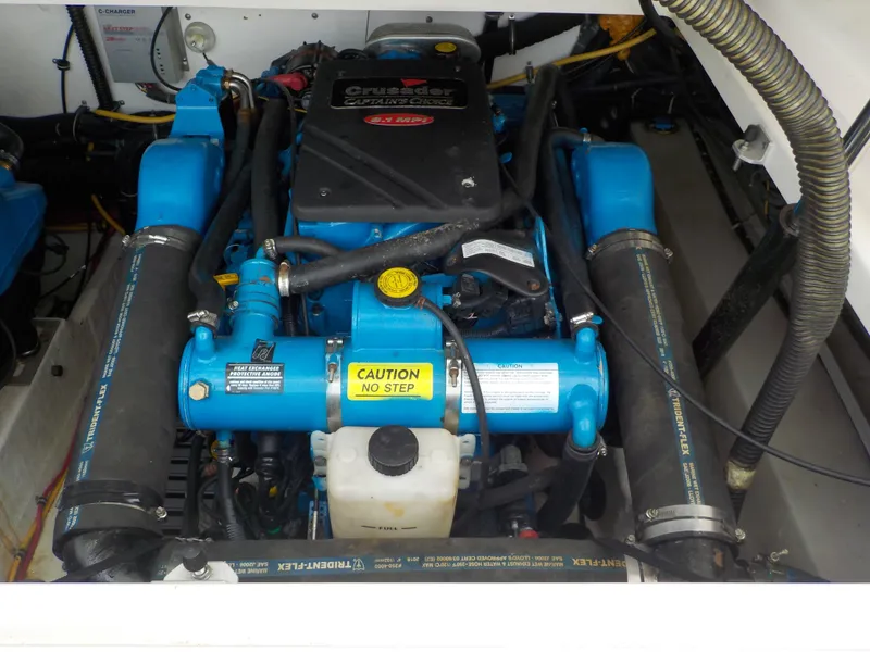 Slide: The Image of Engine compartment of a 2003 Tiara Yachts 3100 Open, featuring a Crusader engine. - 17