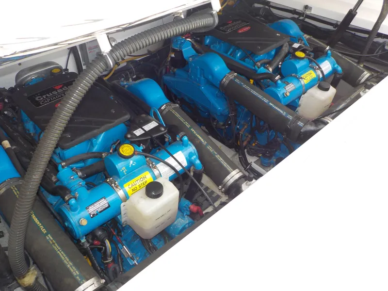 Slide: The Image of Engine compartment of a 2003 Tiara Yachts 3100 Open, featuring dual Crusader engines. - 20