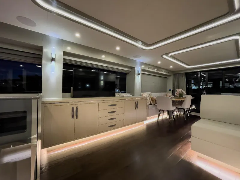 Slide: The Image of Luxurious interior of 2023 Sirena 68 yacht with modern lighting and elegant furnishings. - 18