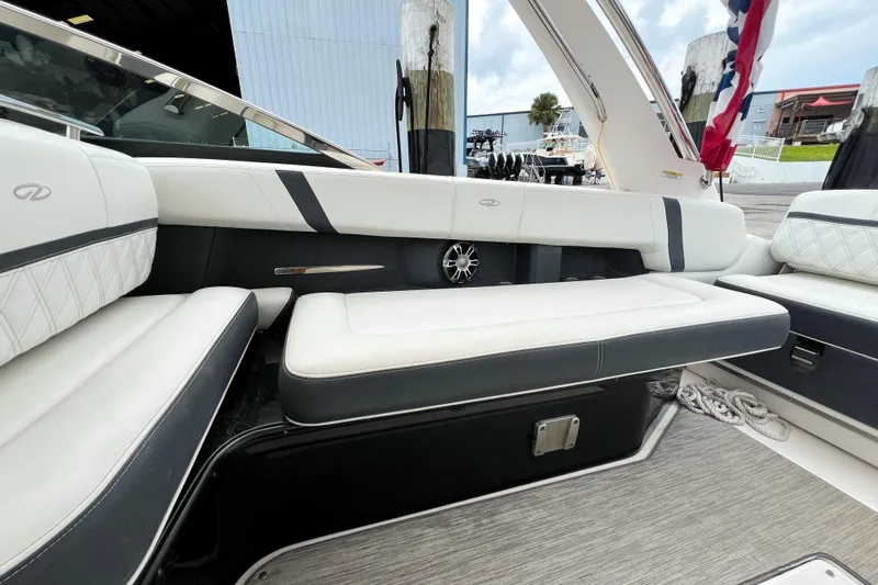 Slide: The Image of 2019 Regal 29 OBX boat interior with white seating and modern design. - 12