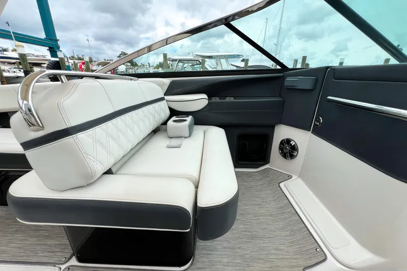 Slide: The Image of Luxurious interior of 2019 Regal 29 OBX boat with plush seating and modern design. - 16