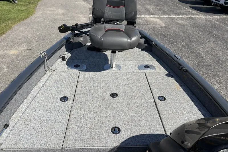 Slide: The Image of 2022 Tracker Pro Team 175 TF boat deck with swivel seat and storage compartments. - 12