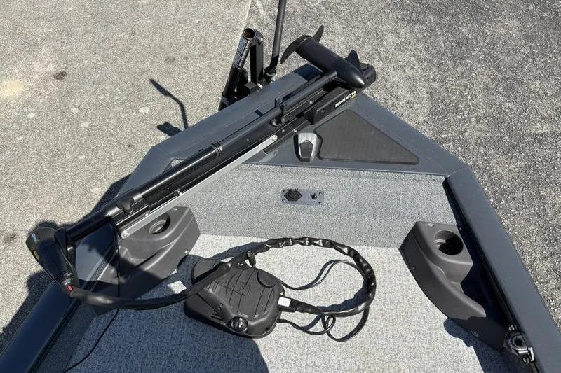 Slide: The Image of 2022 Tracker Pro Team 175 TF boat deck with trolling motor and foot pedal. - 13