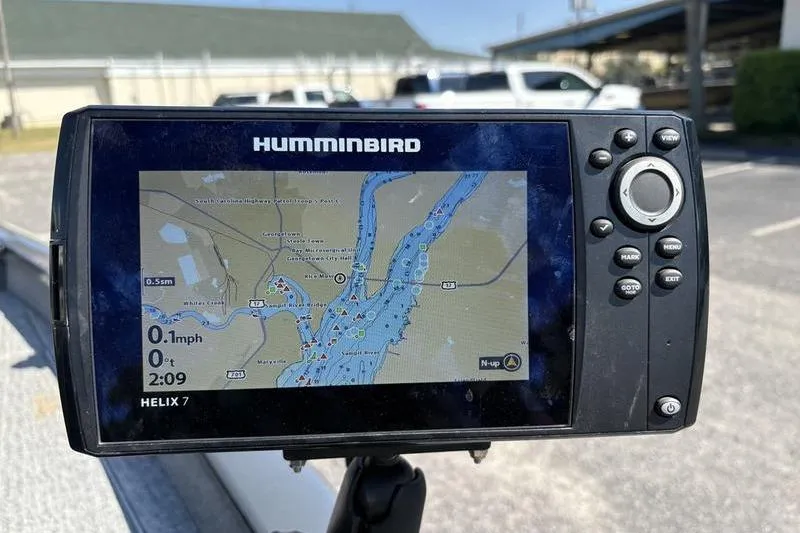 Slide: The Image of Humminbird Helix 7 GPS on 2022 Tracker Pro Team 175 TF boat, displaying a detailed waterway map. - 15