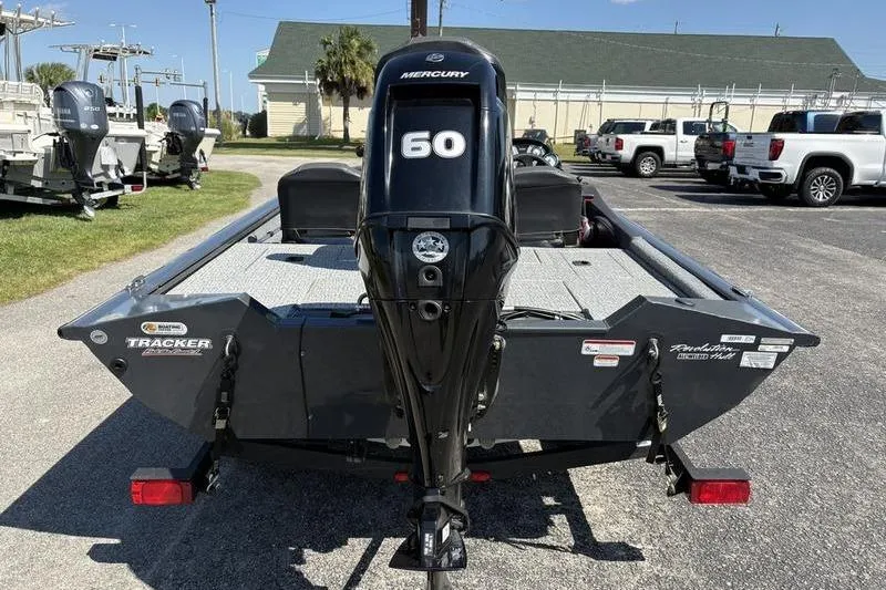 Slide: The Image of 2022 Tracker Pro Team 175 TF boat with Mercury 60 engine, parked outdoors. - 3