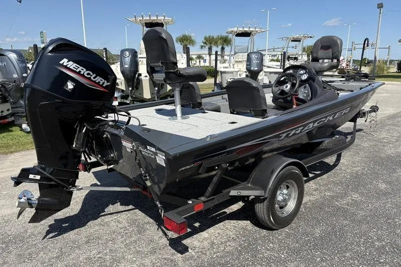 Slide: The Image of 2022 Tracker Pro Team 175 TF fishing boat with Mercury engine on trailer. - 4