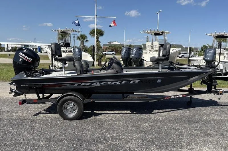 Slide: The Image of 2022 Tracker Pro Team 175 TF fishing boat with Mercury engine on trailer. - 5
