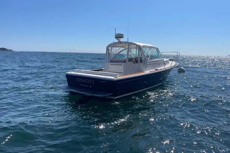 Slide: The Image of 2012 Hunt Surfhunter boat named "Tenacity" on the ocean near Rockport, ME. - 9