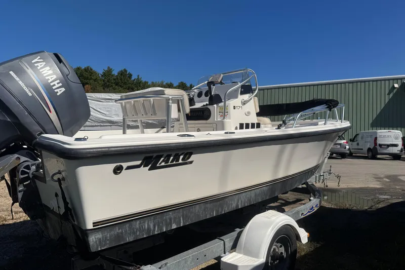 Slide: The Image of 2006 Mako 171 Center Console boat with Yamaha outboard motor on trailer. - 3