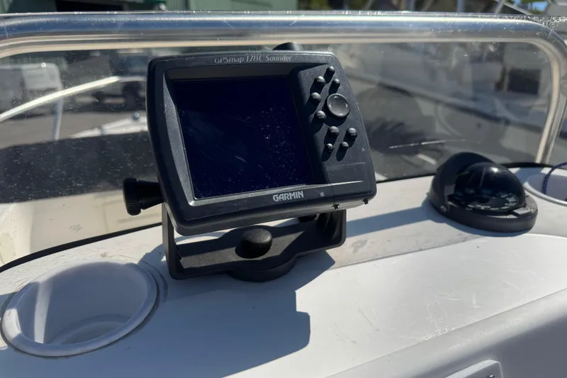 Slide: The Image of 2006 Mako 171 Center Console with Garmin GPS device on dashboard. - 8